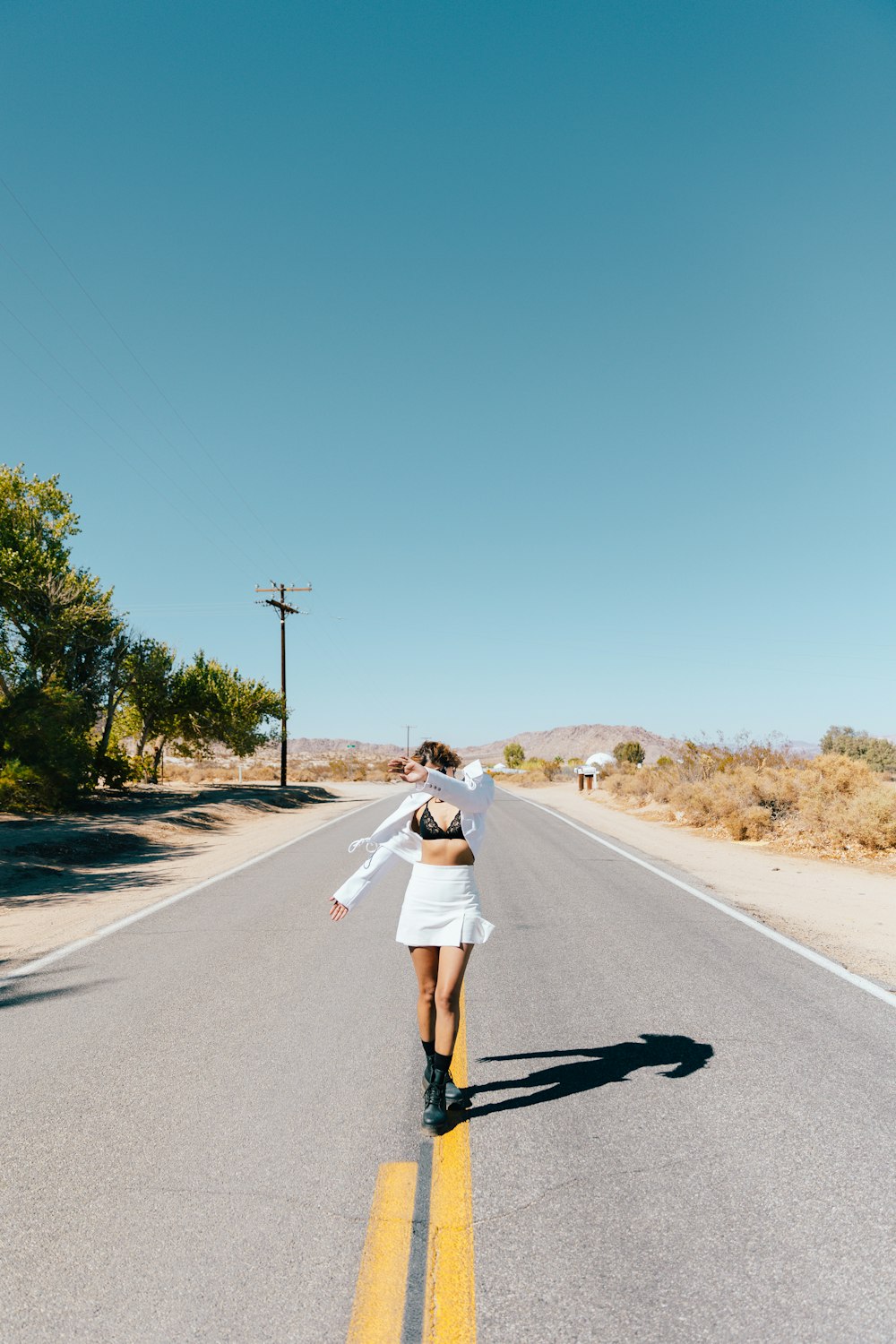 a man walking on a road