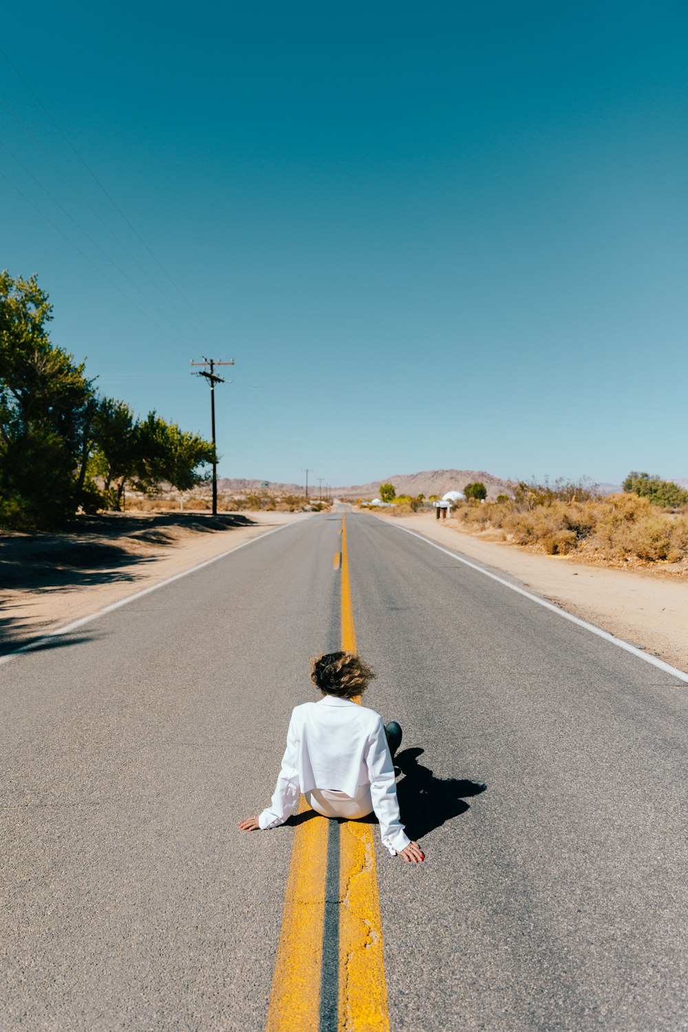 a person walking on a road