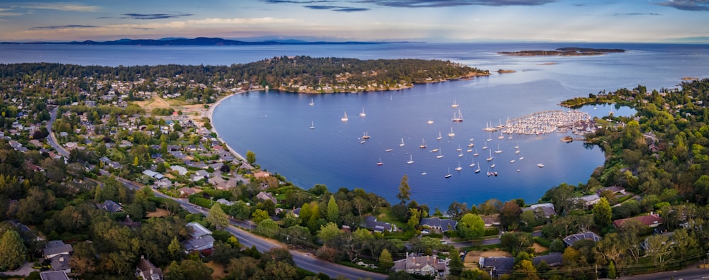 a body of water with boats in it and buildings around it