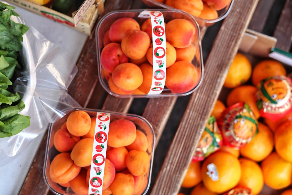 a group of fruits in boxes