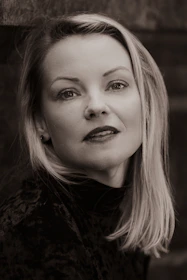 A thoughtful portrait of Agnieszka at a university lecture, engaged and passionate.