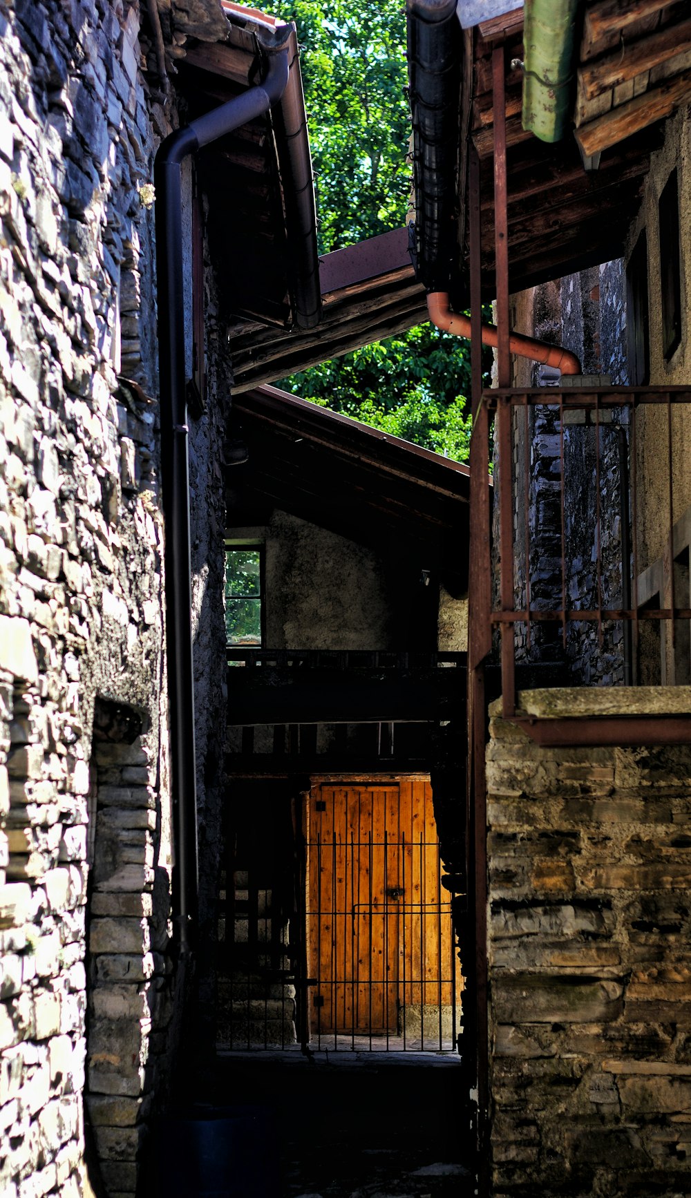 a gate in a brick building