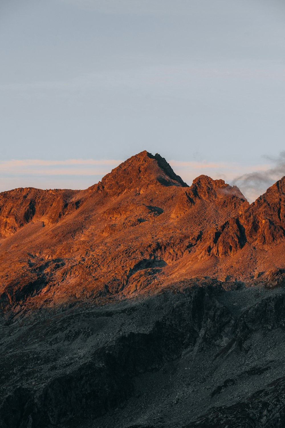 a mountain with a valley below