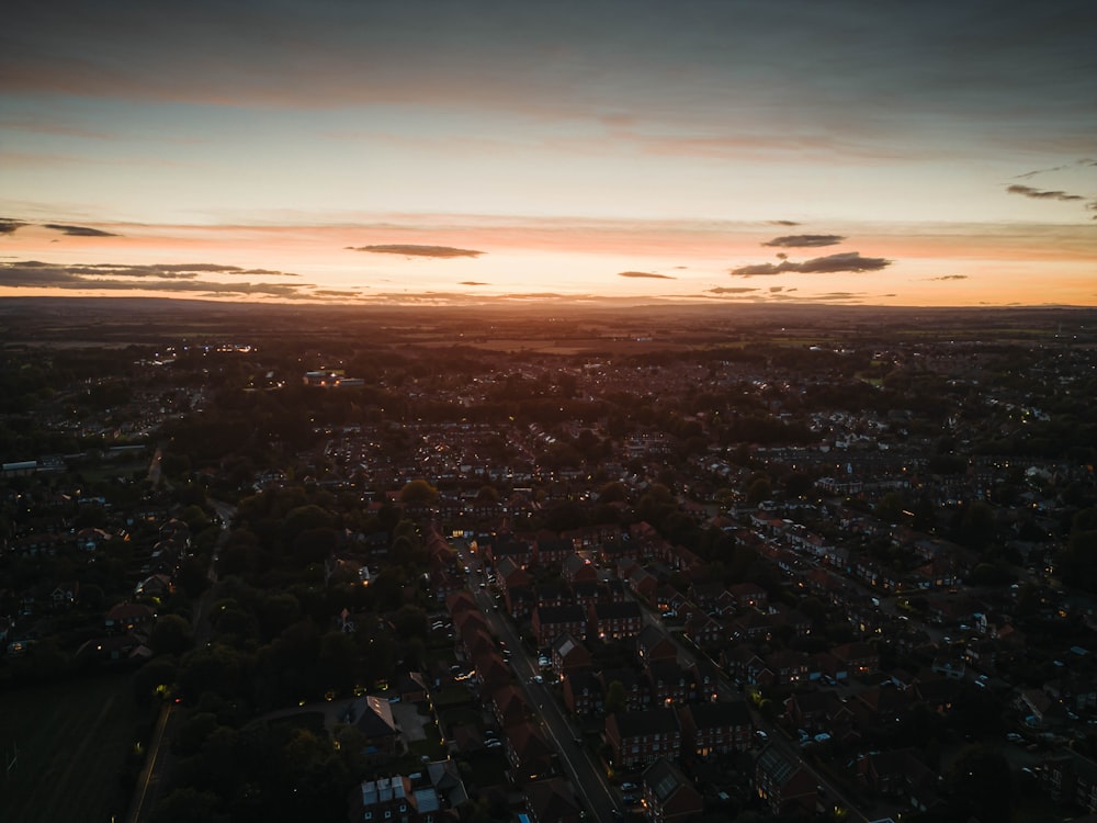 a city with a sunset in the background