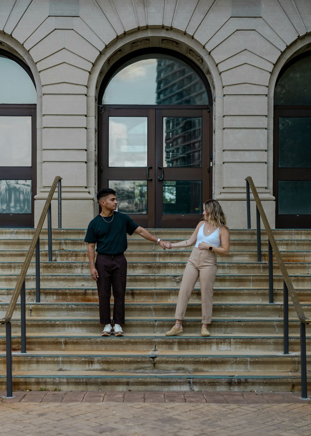 a man and a woman on stairs