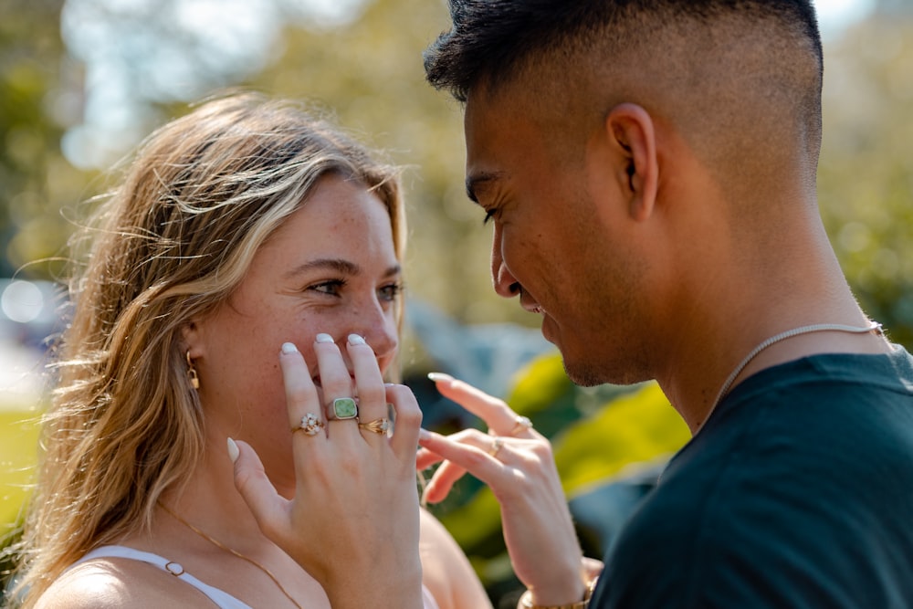 a man and woman kissing