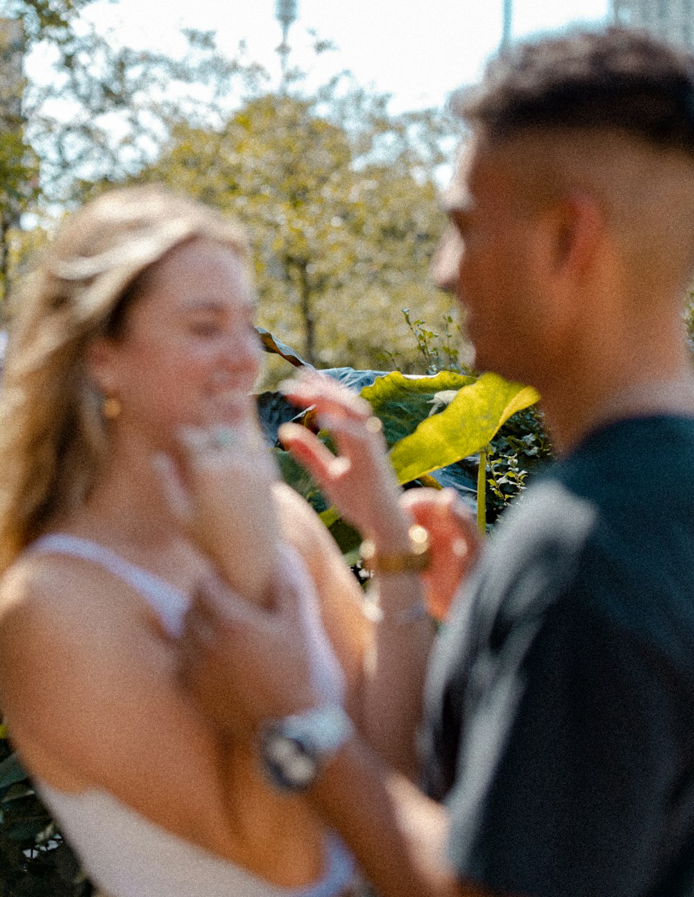 a man and woman holding hands