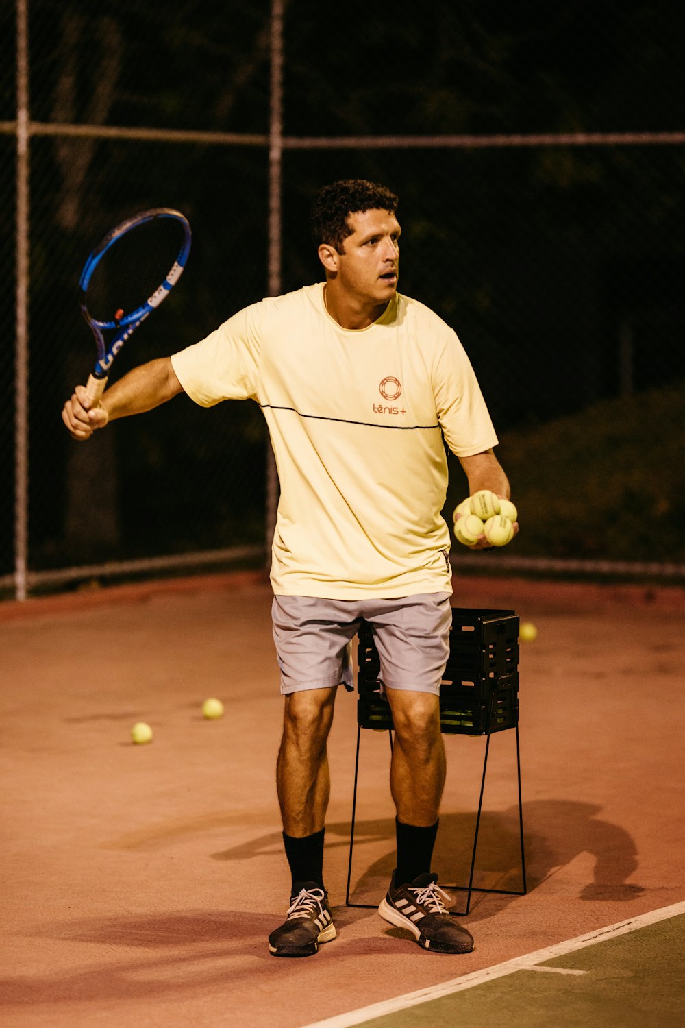 a man playing tennis