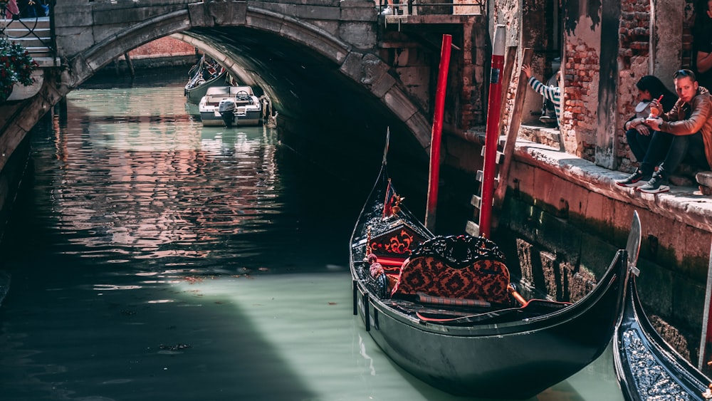 a couple of men on a boat