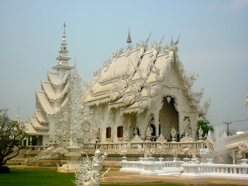 a large white building with towers