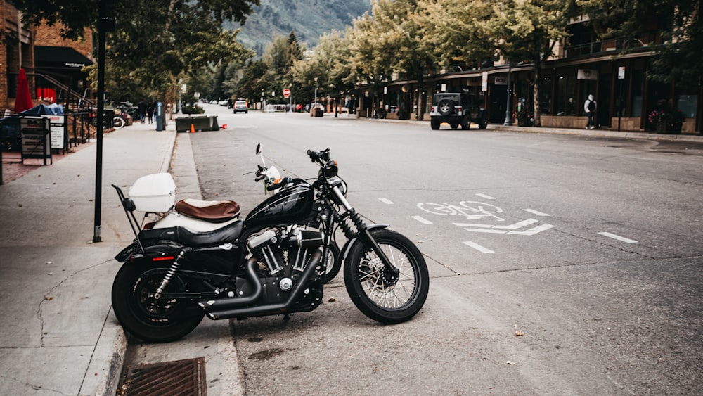 a motorcycle parked on the side of a street