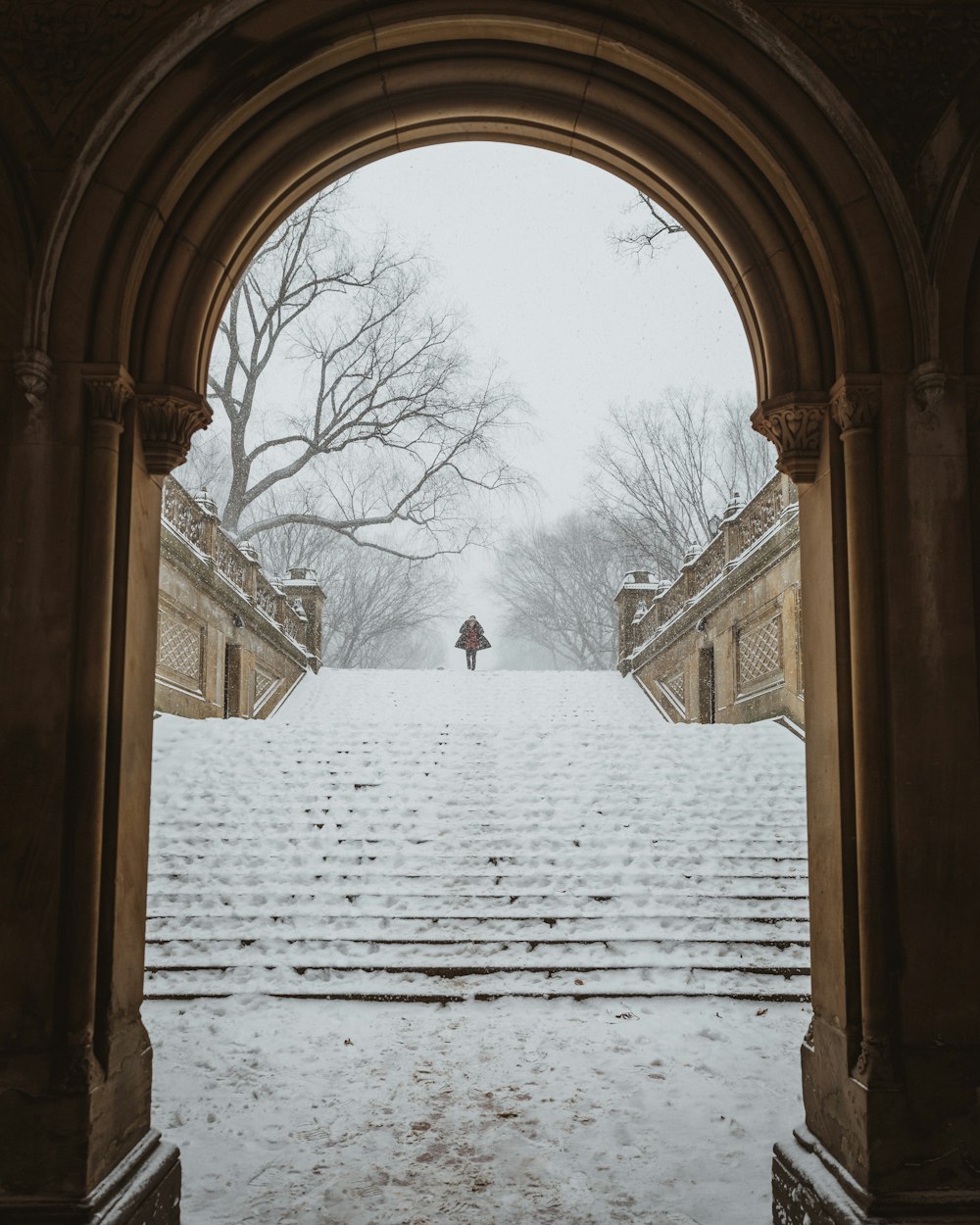 a person walking on a snowy path