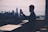 a man taking a picture of a city