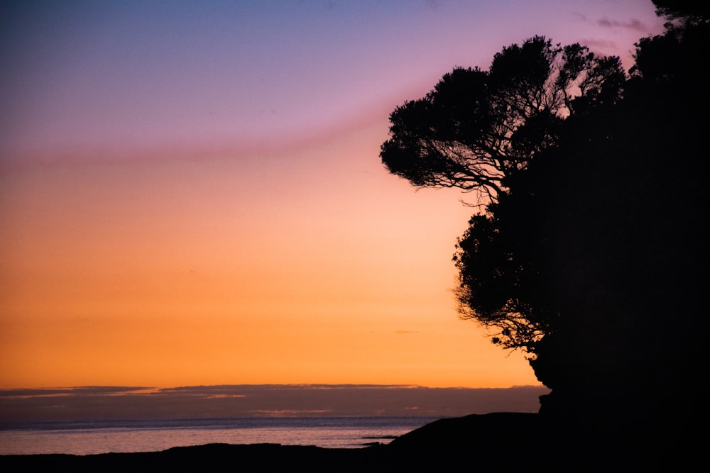 a sunset over a beach