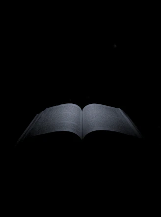 a book open with a black background
