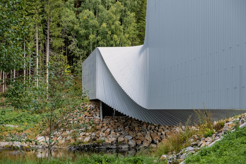 a building with a stone wall