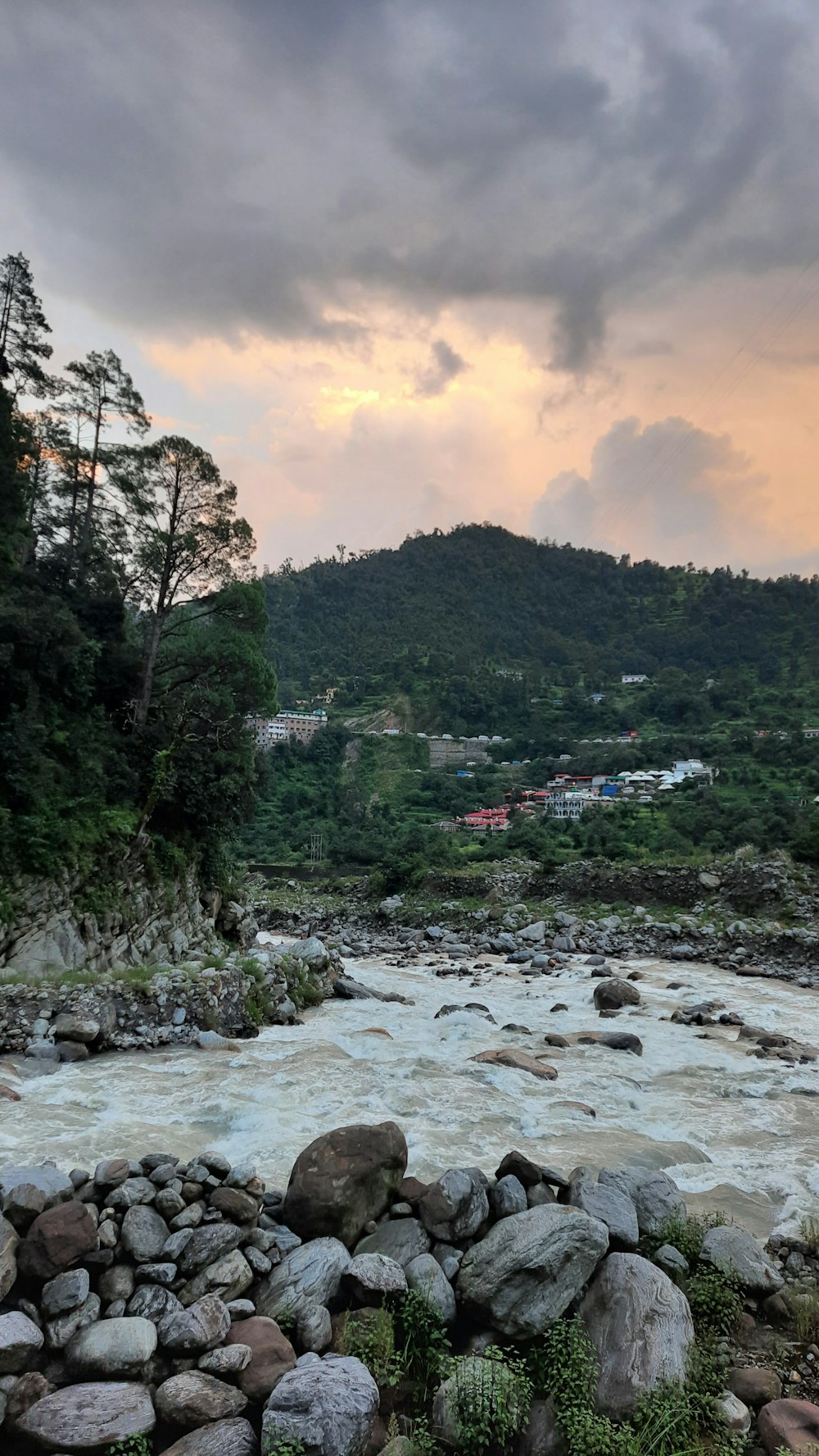 a river with rocks and trees