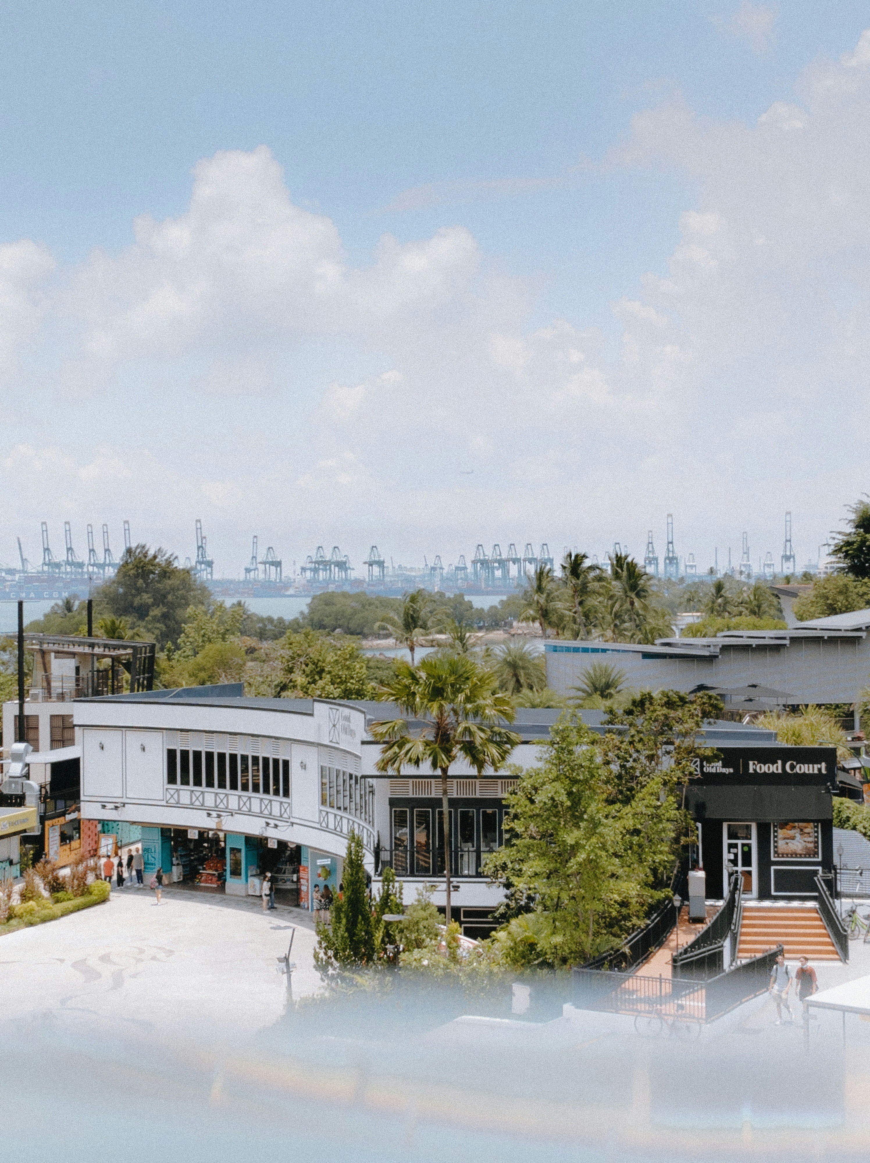 A building with a pool in front of it photo – Free Sentosa Image on ...