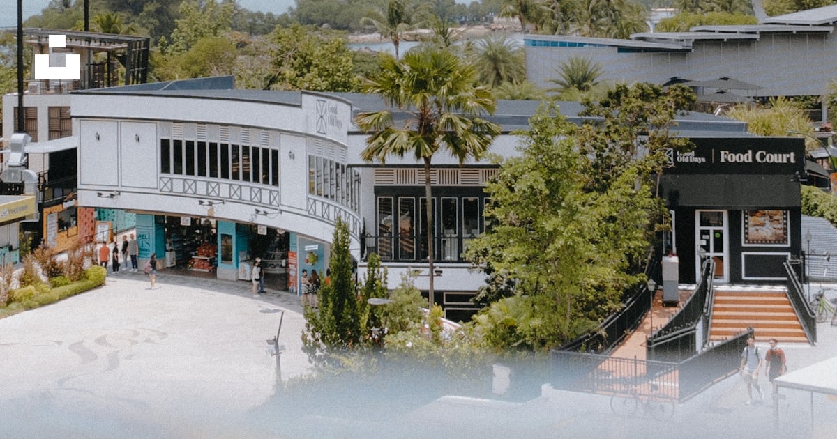 A building with a pool in front of it photo – Free Sentosa Image on ...