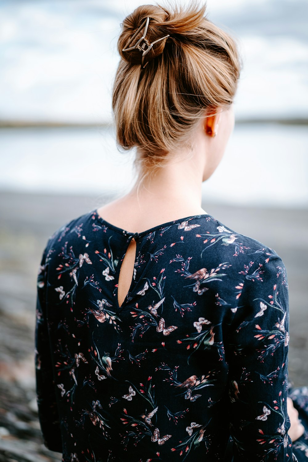 back of a person with a ponytail