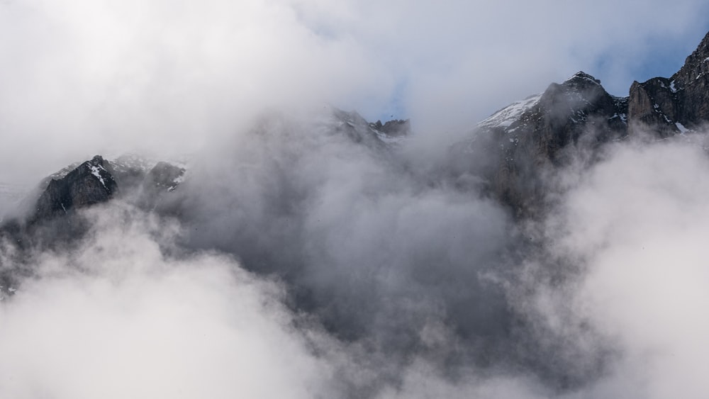 a mountain with clouds