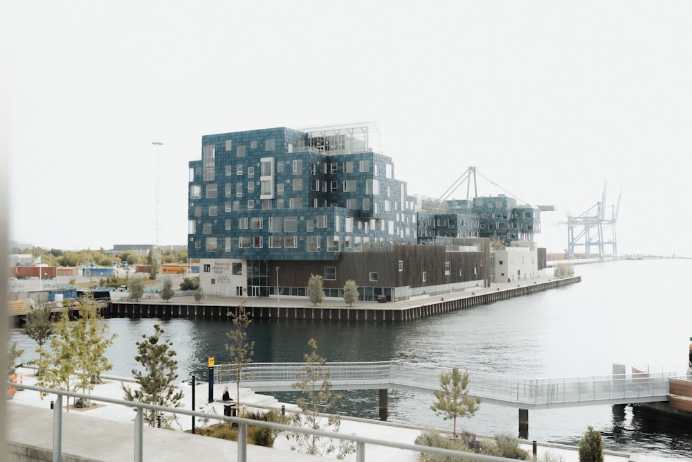 a building next to a body of water