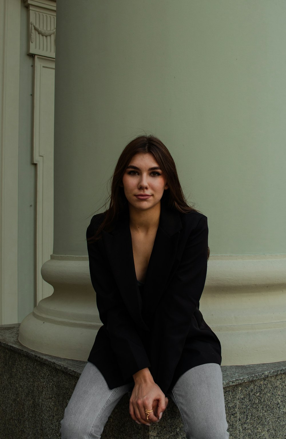 a woman sitting on a couch