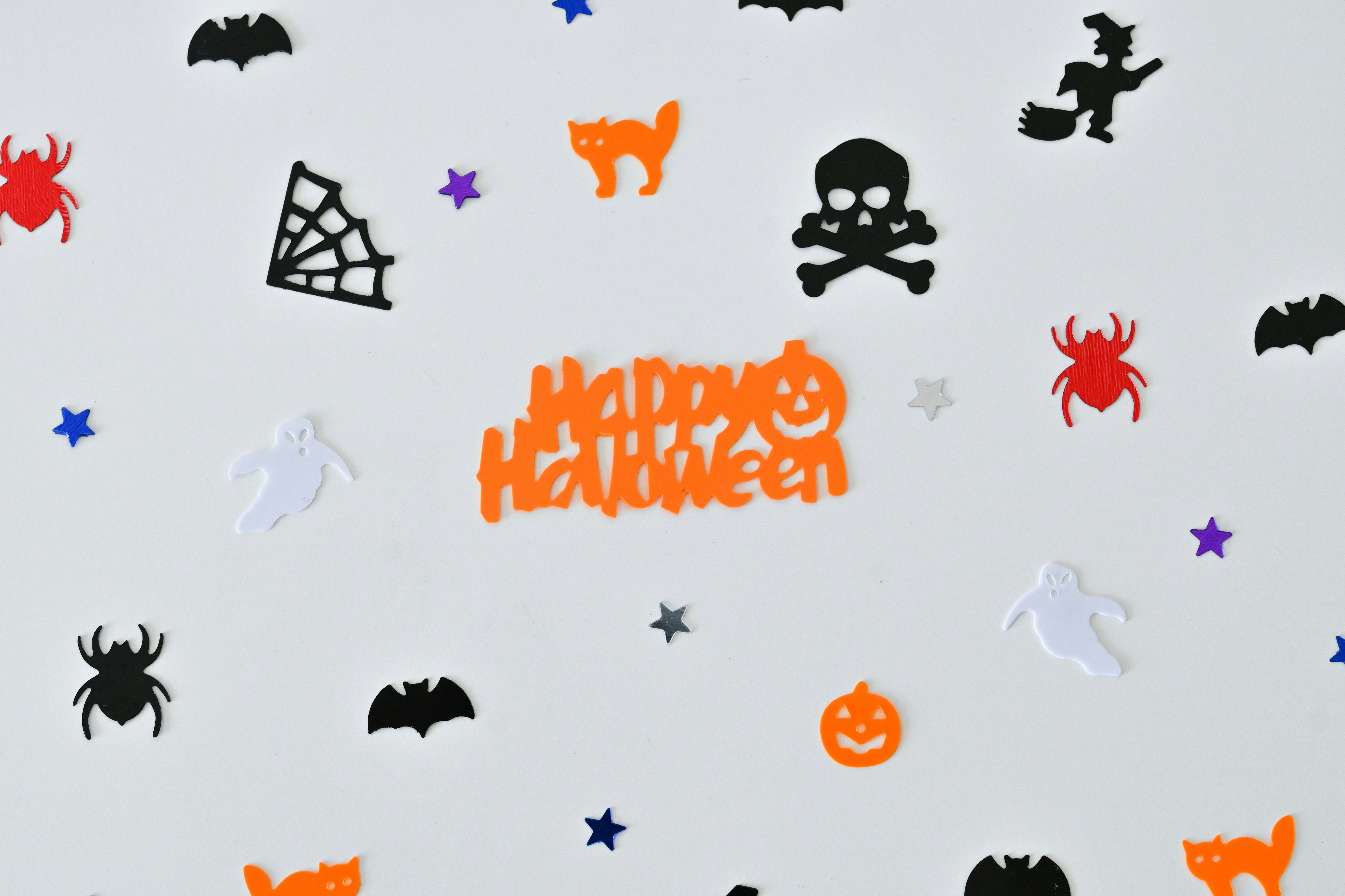 a white surface with black and orange text and a black outline
