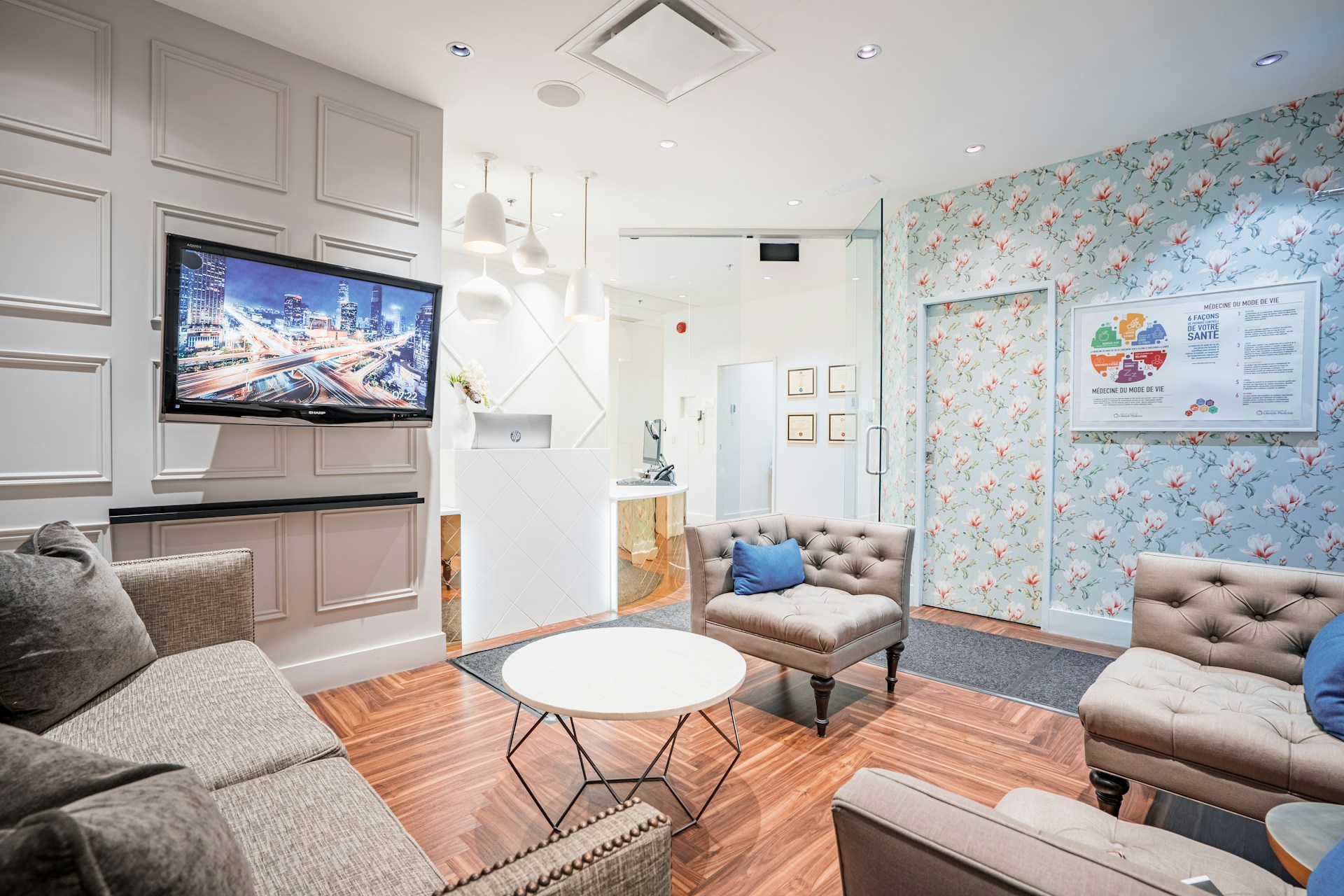 a living room with a tv and couches