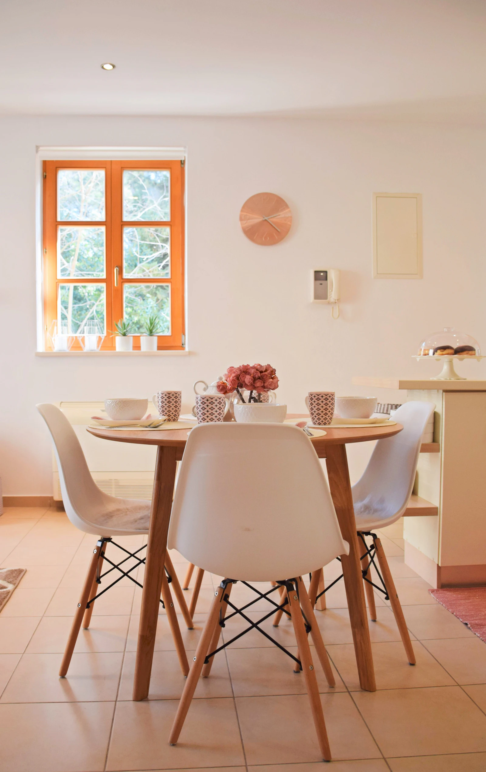 A dining table with chairs around it