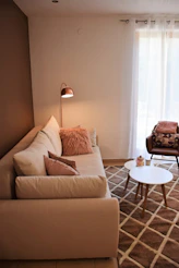 a living room with a couch and a table