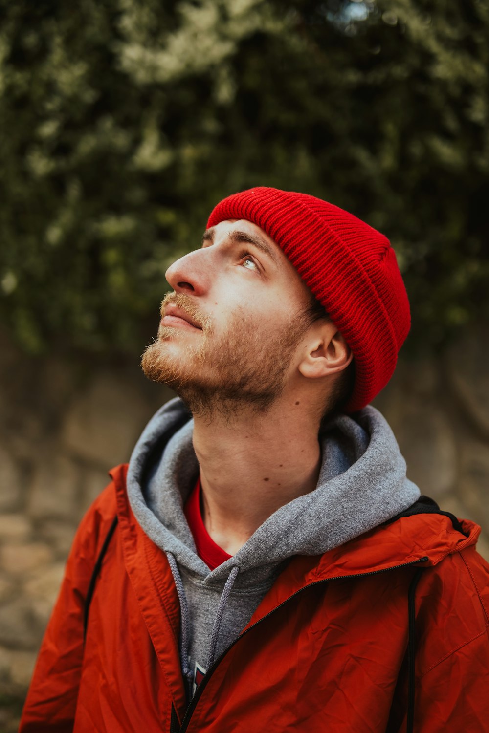 a man wearing a red hat