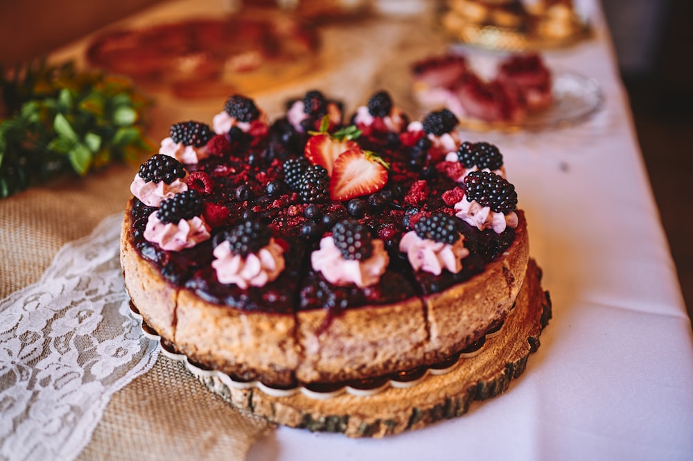 a cake with berries on top