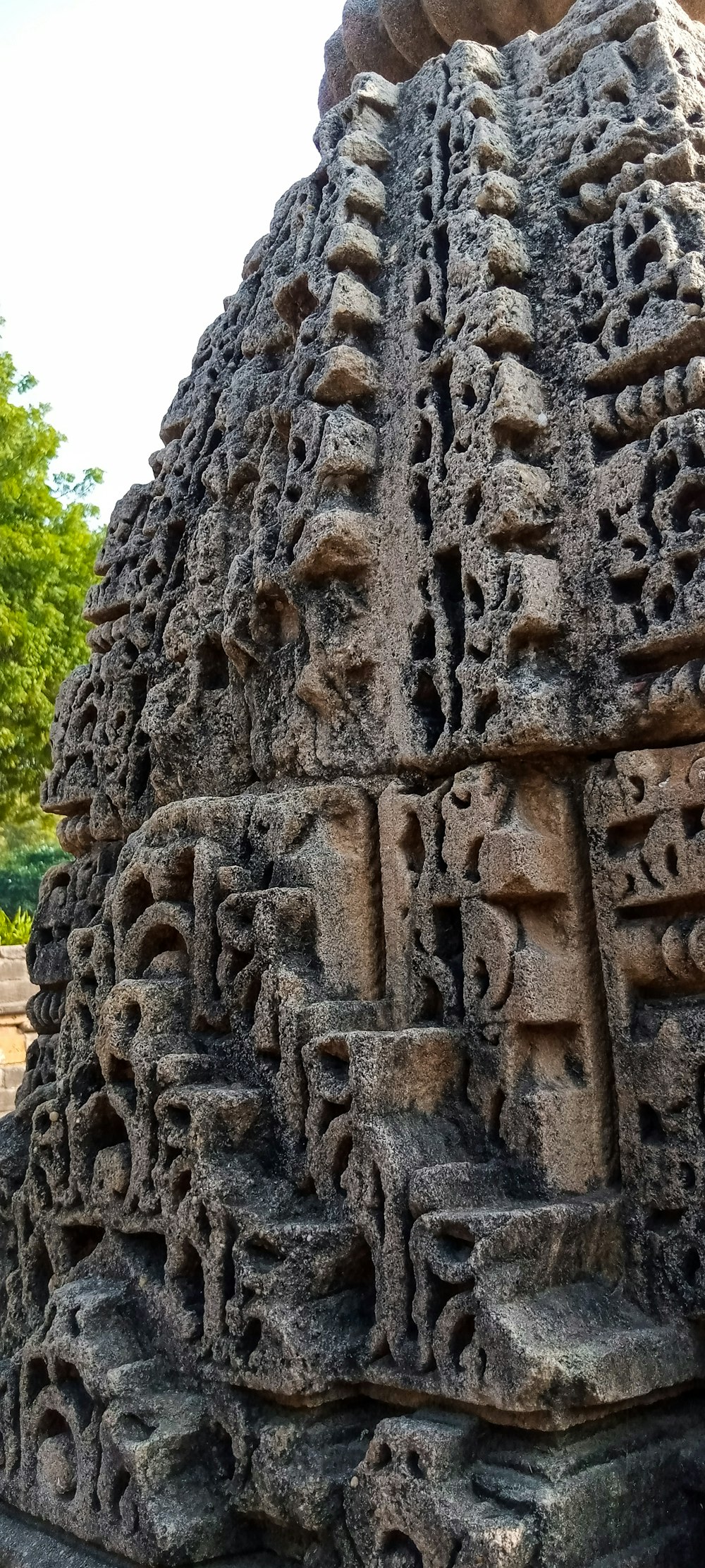 a large rock with carvings