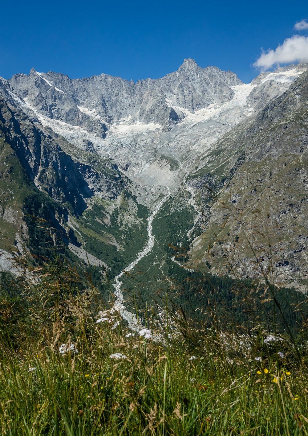 a mountain with a river running through it