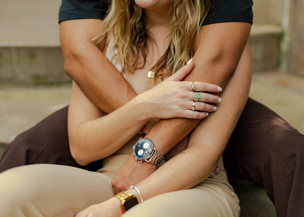 a woman with her hand on her chest