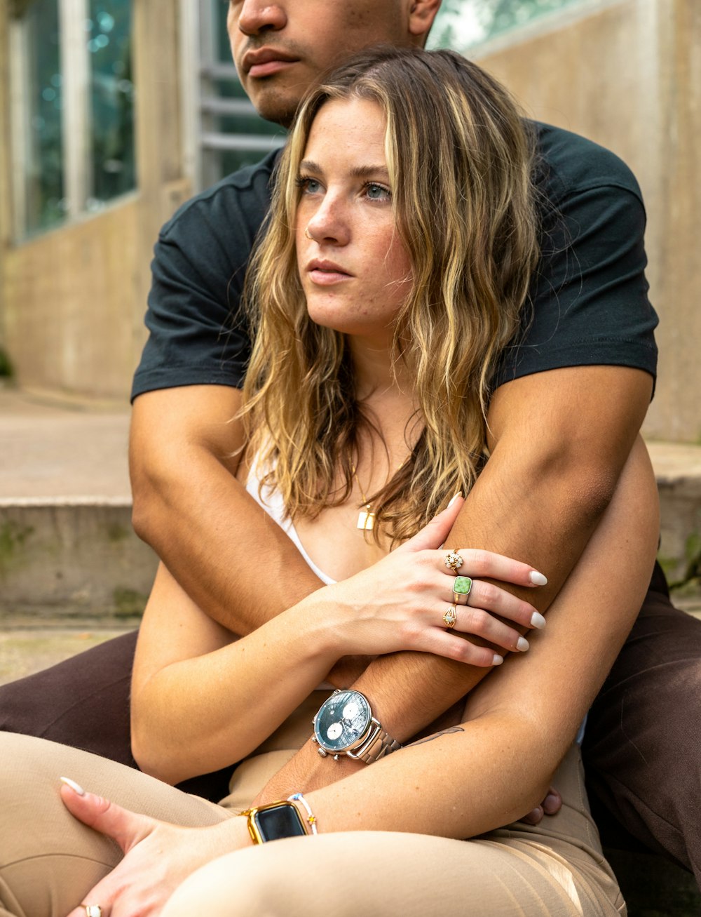 a woman sitting on a bench