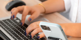 a close-up of hands on a keyboard