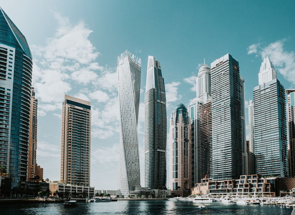 a city skyline with tall buildings