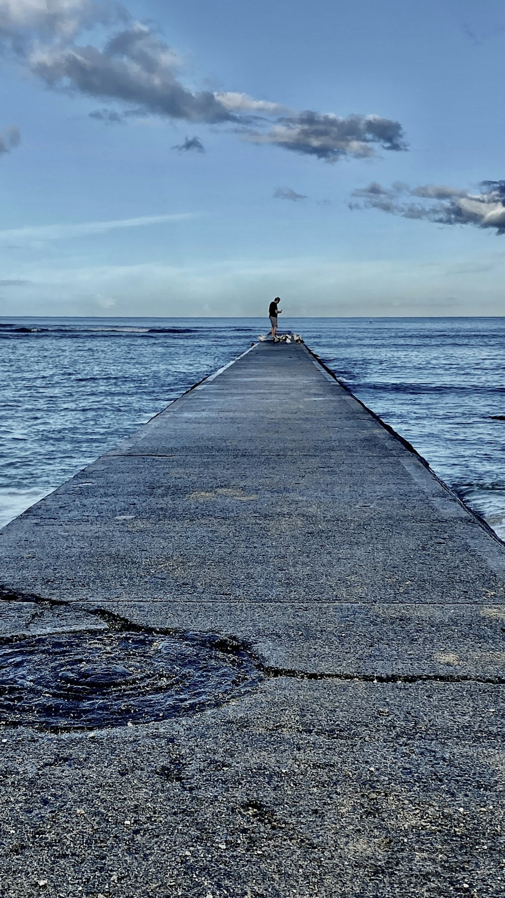 a person standing on a dock