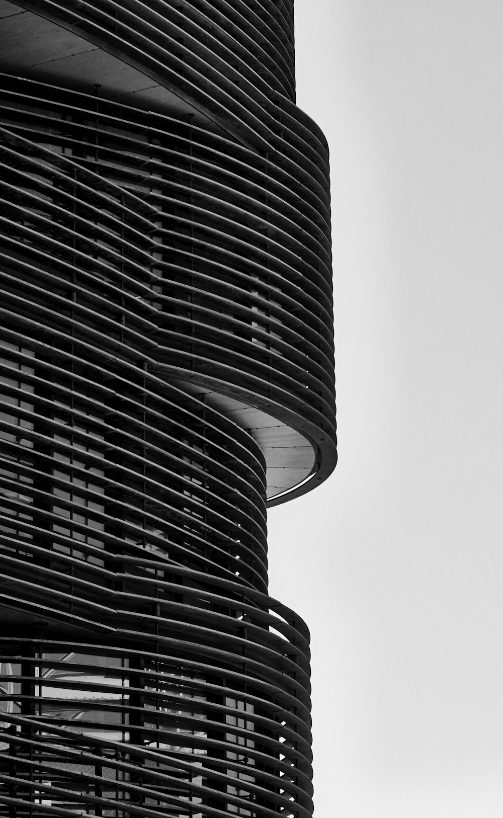 a tall building with a curved top