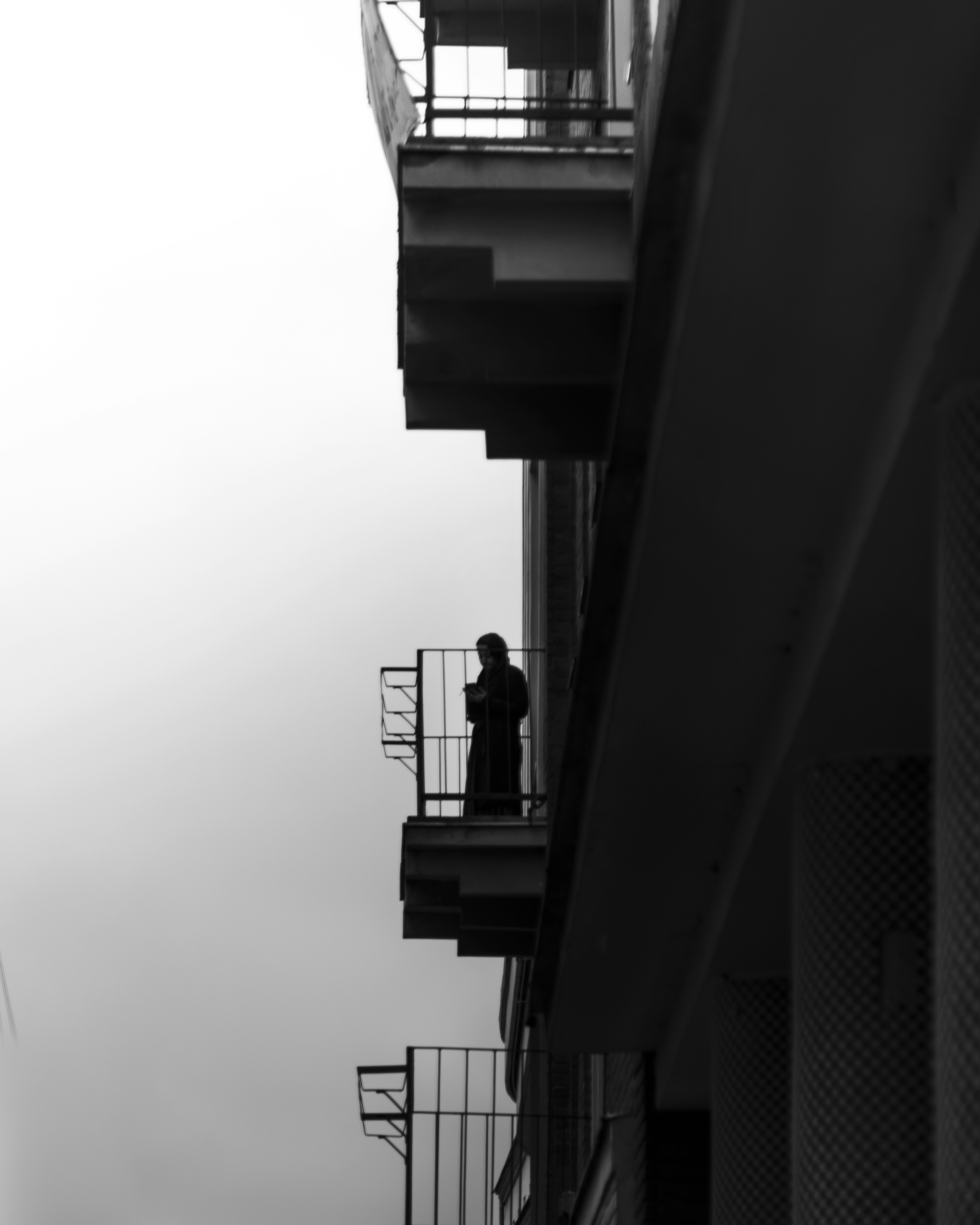 a person standing on a balcony