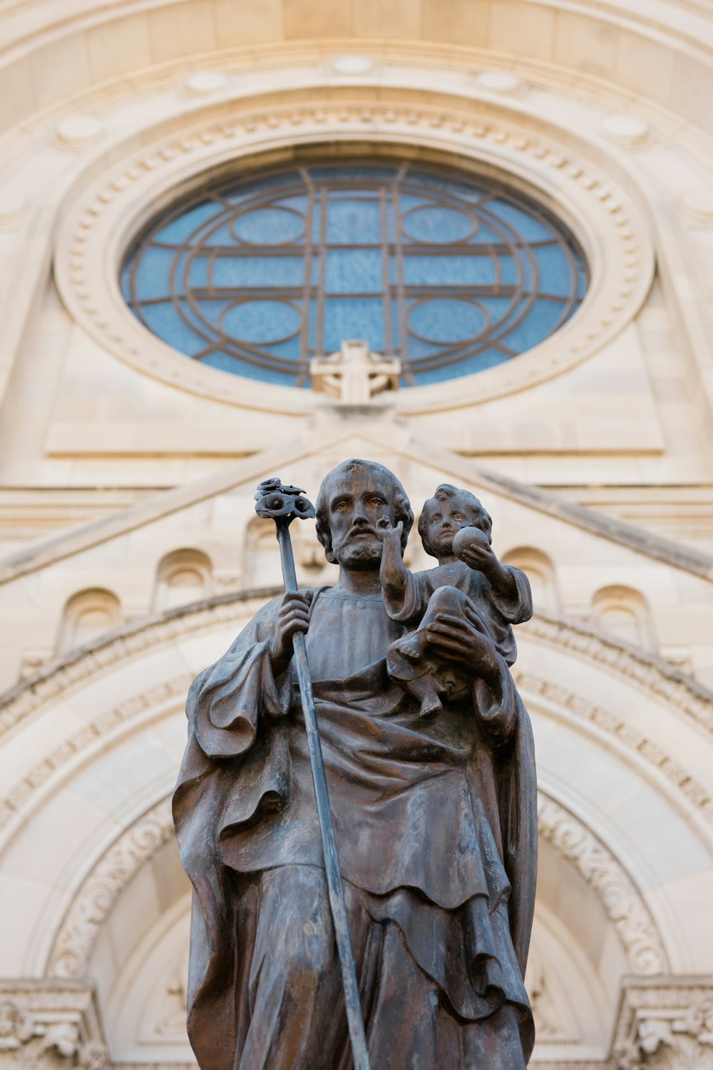 a statue in front of a building