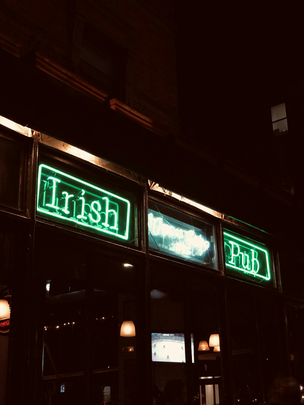 a building with neon signs