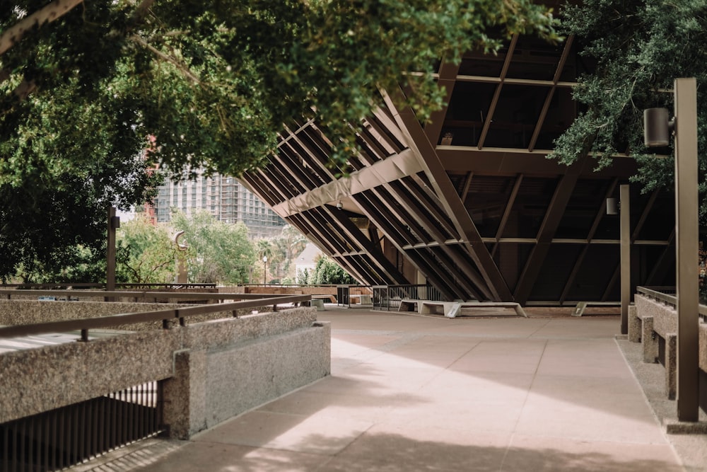 a walkway with a bridge over it