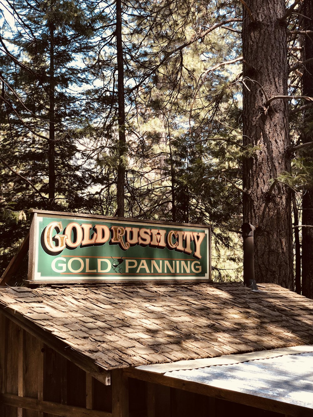 a sign on a wooden building