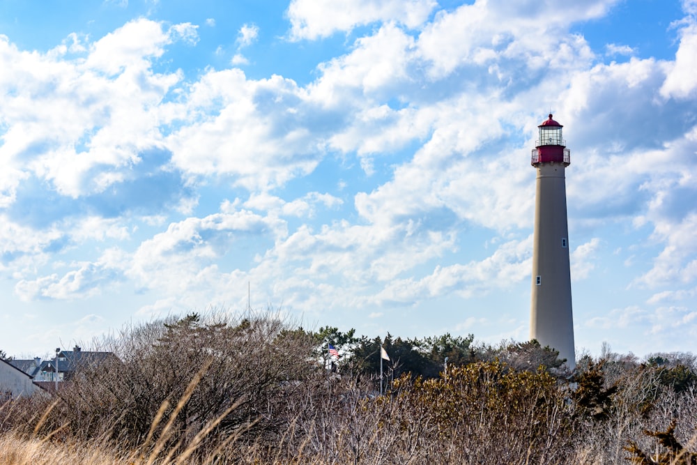 a lighthouse in a field