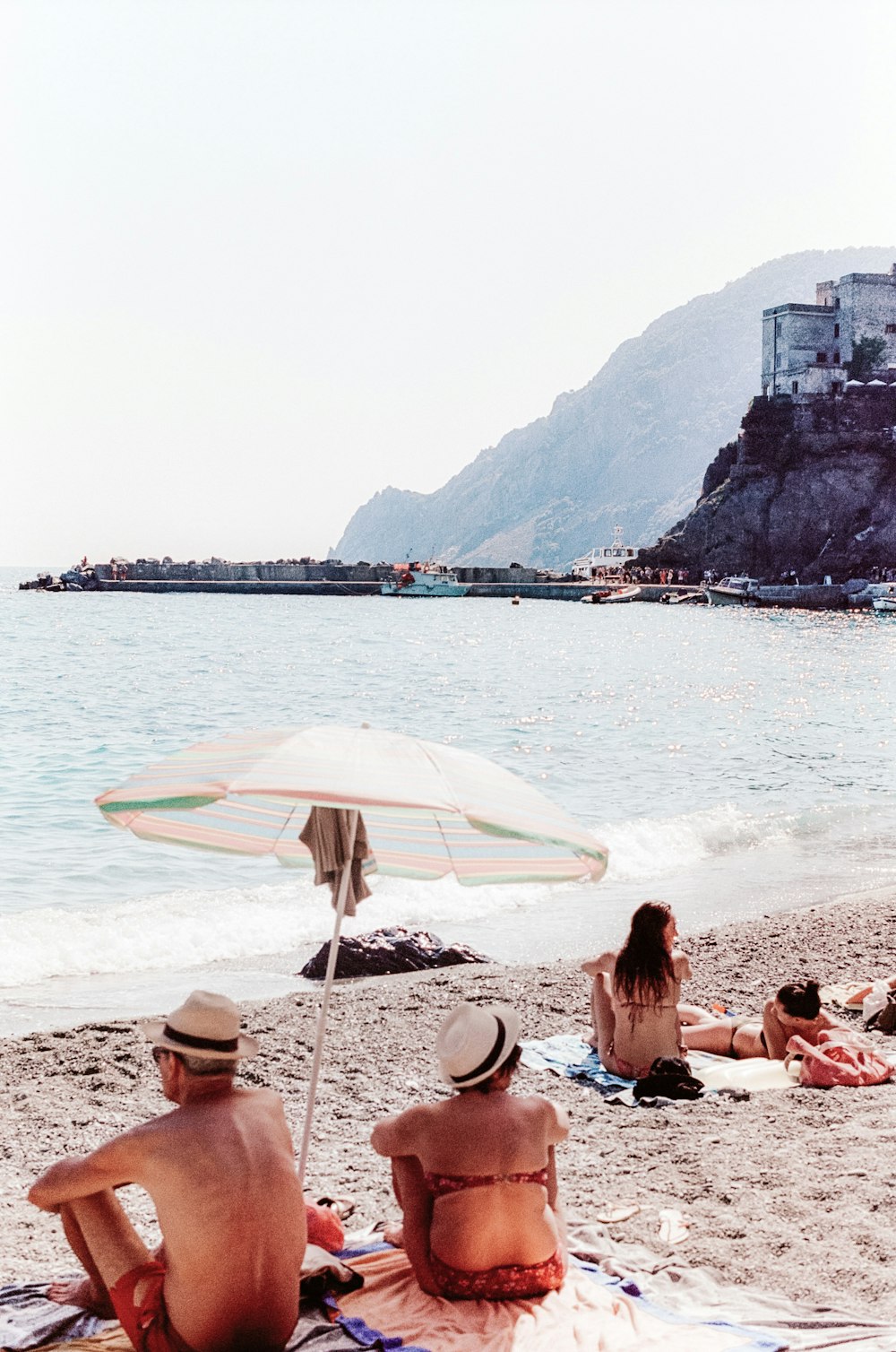 people sitting on a beach