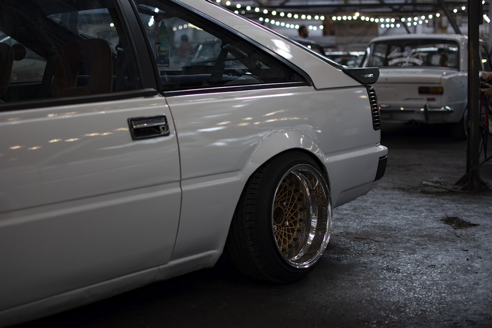 a white car parked in a garage