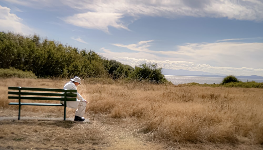 a person sitting on a bench